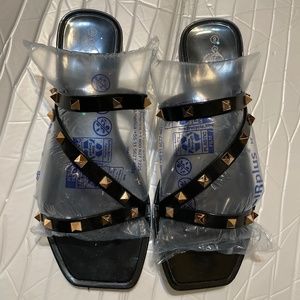 Black studded jelly sandals